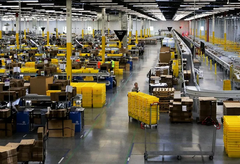 Automated distribution center conveyor system with predictive maintenance sensors